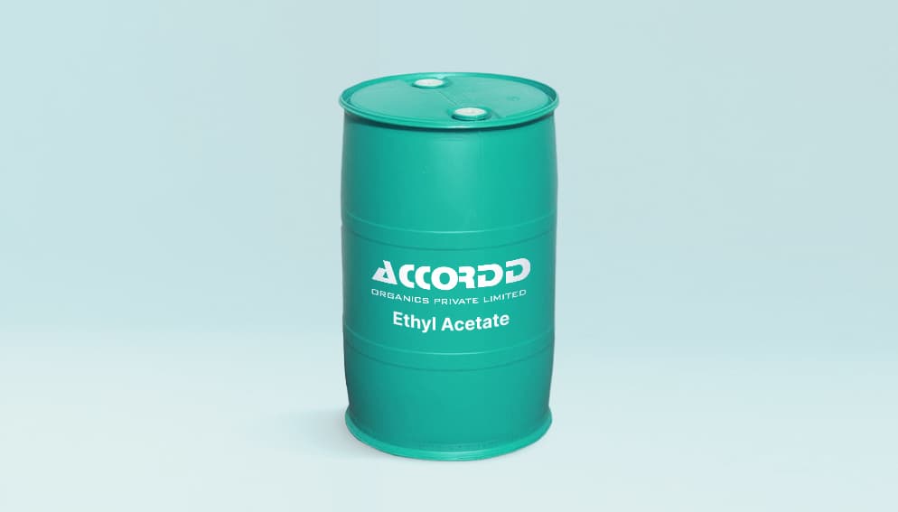 Close-up of a clear liquid in a laboratory flask, representing high-purity Ethyl Acetate